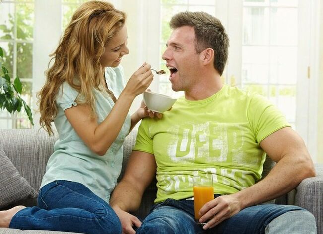 the woman gives the man products to increase potency